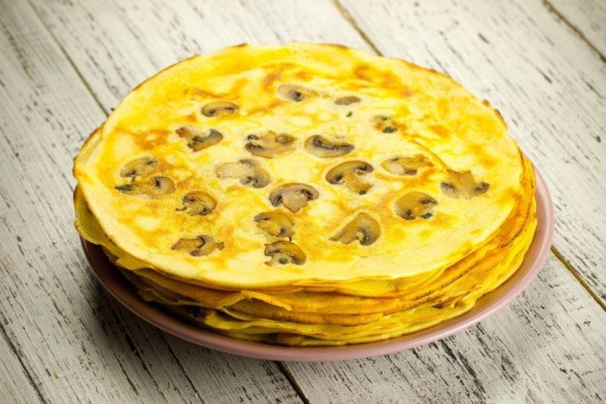 Crepioca de cogumelo (Imagem: Serhiy Shullye | Shutterstock) - (crédito: EdiCase) Crepioca de cogumelo (Imagem: Serhiy Shullye | Shutterstock) - (crédito: EdiCase)