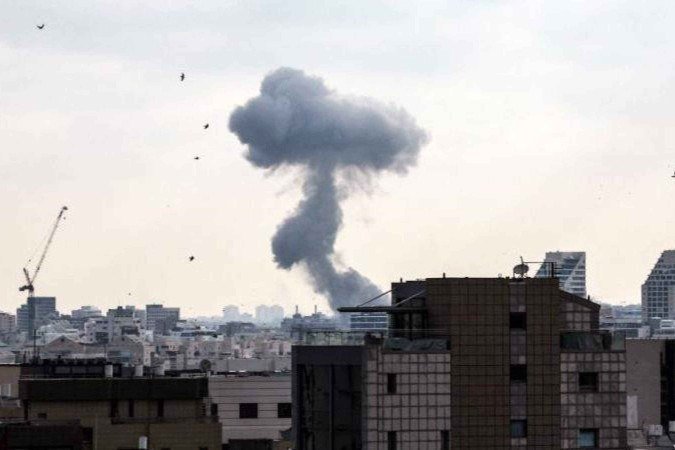 Imagens de satélite mostram o antes e o depois do ataque dos EUA à instalação nuclear -  (crédito: Reuters)