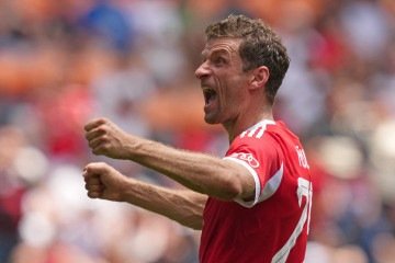 Thomas Muller foi o primeiro atleta a fazer um gol no novo formato do mundial de clubes e na Copa do Mundo de seleções       -  (crédito:  Getty Images via AFP)
