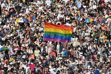 People take part in the Budapest Pride parade in Budapest downtown on June 28, 2025, as the capital's municipality organised this march by the LGBTQ community, celebrating freedom, in a move to circumvent a law that allows police to ban LGBTQ marches. Hungary's Prime Minister had announced that police will not People take part in the Budapest Pride parade in Budapest downtown on June 28, 2025, as the capital's municipality organised this march by the LGBTQ community, celebrating freedom, in a move to circumvent a law that allows police to ban LGBTQ marches. Hungary's Prime Minister had announced that police will not
