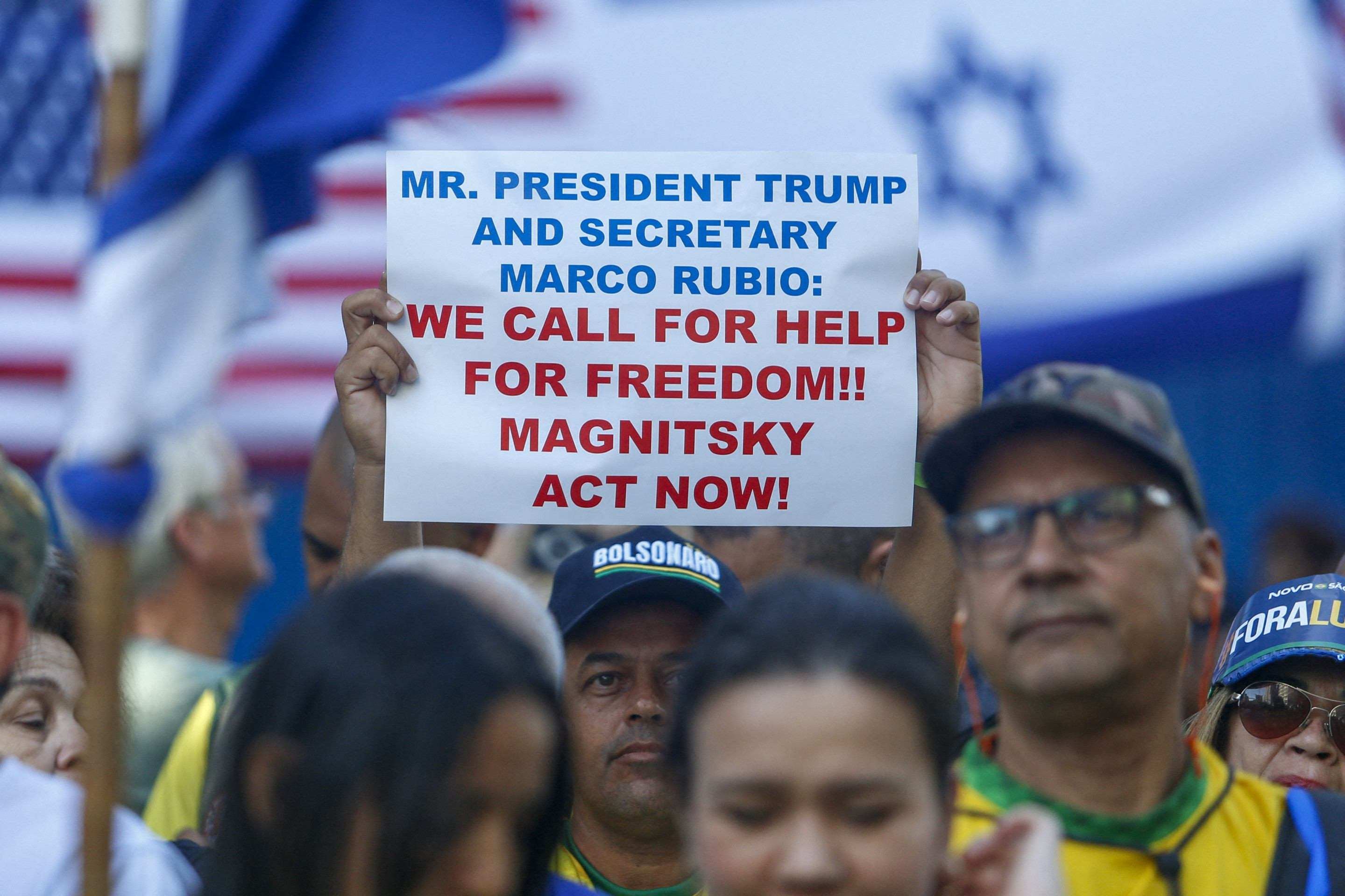  A supporter of Brazils former President Jair Bolsonaro holds a sign during a rally on Paulista Avenue in Sao Paulo, Brazil, on June 29, 2025. Former Brazilian President Jair Bolsonaro called on his supporters on Sunday to demonstrate in Sao Paulo in the name of 