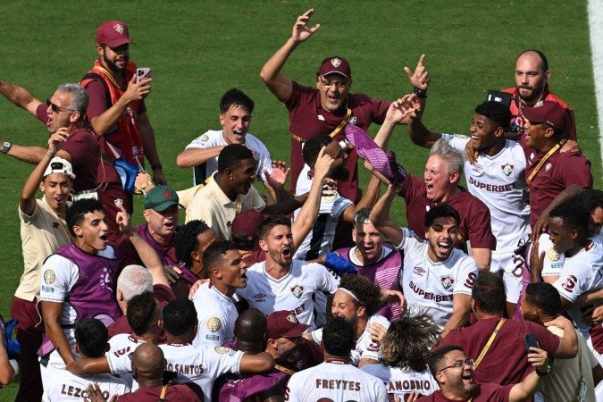 Em diversas publicações, principalmente no Instagram, os torcedores do tricolor carioca festejaram o triunfo e empilharam piadas, memes e provocações - (crédito: AFP) Em diversas publicações, principalmente no Instagram, os torcedores do tricolor carioca festejaram o triunfo e empilharam piadas, memes e provocações - (crédito: AFP)