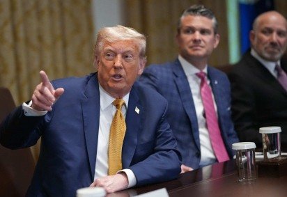 Primeira ameaça do presidente norte-americano ao Brasil foi durante a cúpula do Brics -  (crédito: Andrew Harnik/AFP       )
