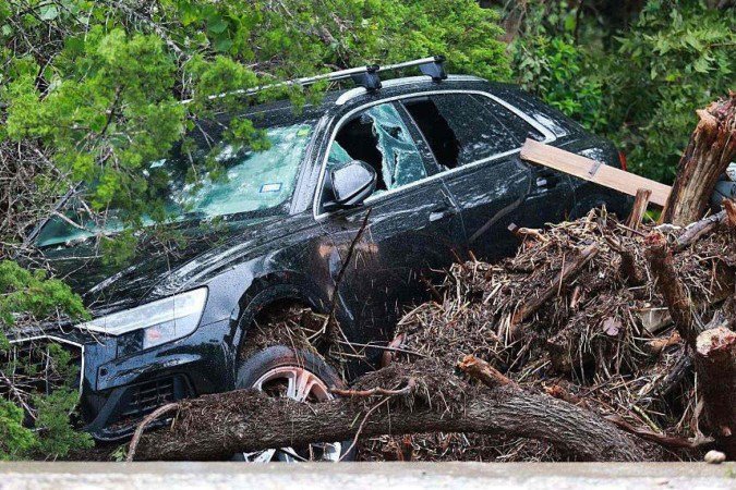 Pelo menos 27 meninas do acampamento cristão Mystic morreram quando as águas da enchente atingiram o local, segundo as autoridades - (crédito: Danielle Villasana/The Washington Post/Getty Images) Pelo menos 27 meninas do acampamento cristão Mystic morreram quando as águas da enchente atingiram o local, segundo as autoridades - (crédito: Danielle Villasana/The Washington Post/Getty Images)