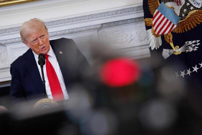  WASHINGTON, DC - JULY 14: U.S. President Donald Trump delivers remarks during a White House Faith Office luncheon in the State Dining Room at the White House on July 14, 2025 in Washington, DC. Pastor Paula White-Cain, the head of the White House Faith Office, hosted the luncheon with members of government and faith-based and community organizations.   Kevin Dietsch/Getty Images/AFP (Photo by Kevin Dietsch / GETTY IMAGES NORTH AMERICA / Getty Images via AFP)
    