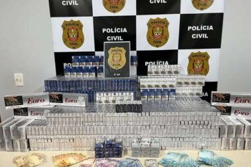 Foragido da Justiça é preso com identidade falsa, carga de cigarros contrabandeados e papagaio em cativeiro -  (crédito: PCDF)