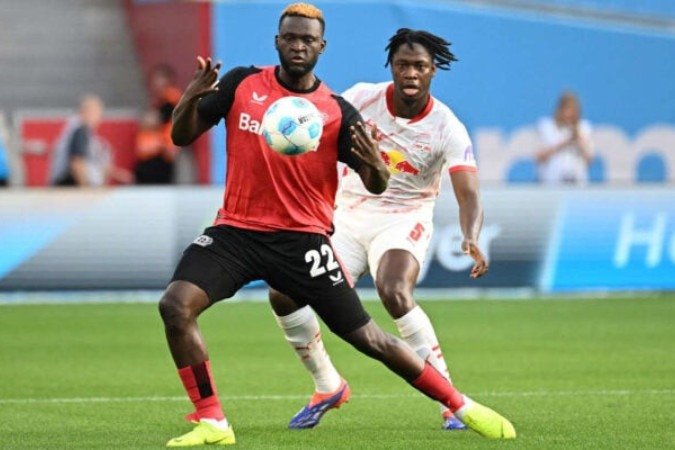 Boniface em partida do Bayer Leverkusen -  (crédito: Foto UWE KRAFT/AFP via Getty Images)