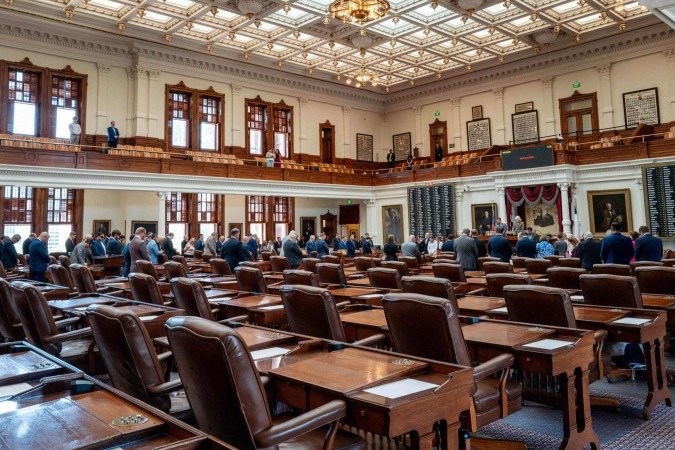 Vários assentos na sede do Legislativo do estado do Texas, em Austin, permaneceram vazios, ontem - (crédito: Brandon Bell/Getty Images/AFP) Vários assentos na sede do Legislativo do estado do Texas, em Austin, permaneceram vazios, ontem - (crédito: Brandon Bell/Getty Images/AFP)