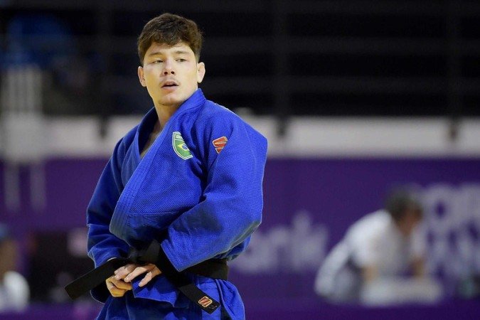 Brasiliense fez luta dura contra adversário colombiano, mas persistiu até colocar a medalha de bronze no peito em Assunção -  (crédito: Alexandre Loureiro/CBJ)