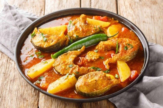Peixe com curry e batatas (Imagem: Sergii Koval
| Shutterstock) - (crédito: EdiCase) Peixe com curry e batatas (Imagem: Sergii Koval
| Shutterstock) - (crédito: EdiCase)