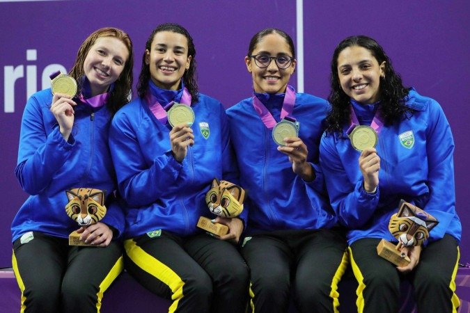 Revezamento misto: a equipe do Time Brasil recebe a medalha de ouro - (crédito: Felipe Zanca/Panam Sports via Xpress Media) Revezamento misto: a equipe do Time Brasil recebe a medalha de ouro - (crédito: Felipe Zanca/Panam Sports via Xpress Media)