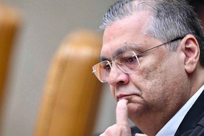 Instituições financeiras estão entre seguir a decisão de Dino ou a Magnitsky - (crédito: EVARISTO SA/AFP via Getty Images) Instituições financeiras estão entre seguir a decisão de Dino ou a Magnitsky - (crédito: EVARISTO SA/AFP via Getty Images)