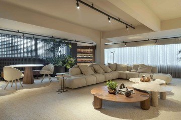 O Raízes do Agora traduz a harmonia entre a serenidade dos elementos naturais e a sofisticação do design contemporâneo no ambiente