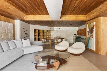 No Living Permanecer, as poltronas trazem leveza ao layout,