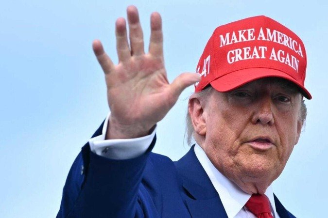 Apesar do PIB bom, analistas dizem que não é hora de comemorar o Maga -  (crédito: Mandel Ngan/ AFP)