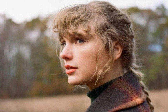 Taylor Swift vive “final feliz” que antecipou em músicas -  (crédito: TMJBrazil)