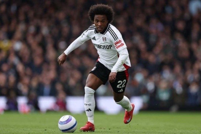Willian passa a ser alvo que se encaixa em perfil de contratação bombástica, depois de insucesso nas negociações por Roger Guedes - (crédito: Foto: Clive Rose / Getty Images) Willian passa a ser alvo que se encaixa em perfil de contratação bombástica, depois de insucesso nas negociações por Roger Guedes - (crédito: Foto: Clive Rose / Getty Images)