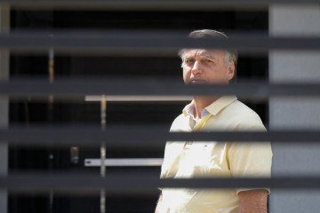 O ex-presidente Jair Bolsonaro está em prisão domiciliar. Ele poderia acompanhar o julgamento in loco, mas preferiu não comparecer -  (crédito: Sergio Lima / AFP)