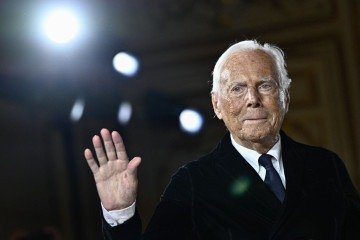O estilista italiano é lembrado como o 'rei do casual chique' - (crédito: AFP) O estilista italiano é lembrado como o 'rei do casual chique' - (crédito: AFP)