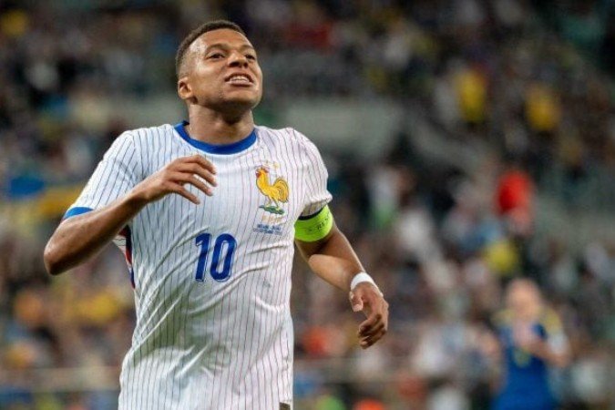 Mbappé em ação com a camisa da seleção francesa na última Data Fifa - (crédito: Foto: Mateusz Slodkowski/Getty Images) Mbappé em ação com a camisa da seleção francesa na última Data Fifa - (crédito: Foto: Mateusz Slodkowski/Getty Images)