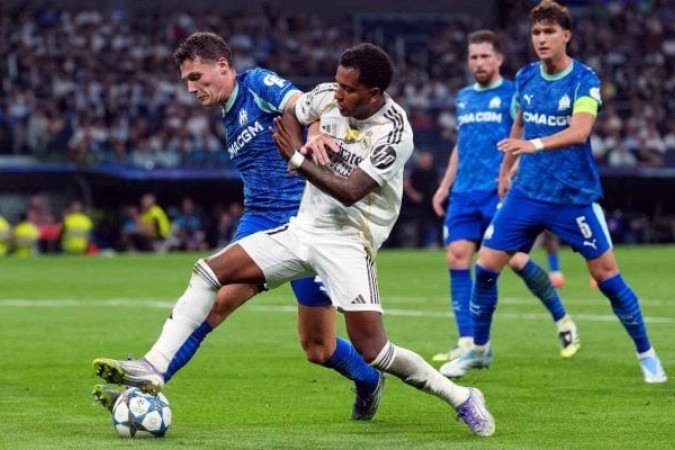 Rodrygo em disputa de bola com jogador do Olympique de Marselha na fase de liga da Champions - (crédito: Foto: Angel Martinez/Getty Images) Rodrygo em disputa de bola com jogador do Olympique de Marselha na fase de liga da Champions - (crédito: Foto: Angel Martinez/Getty Images)