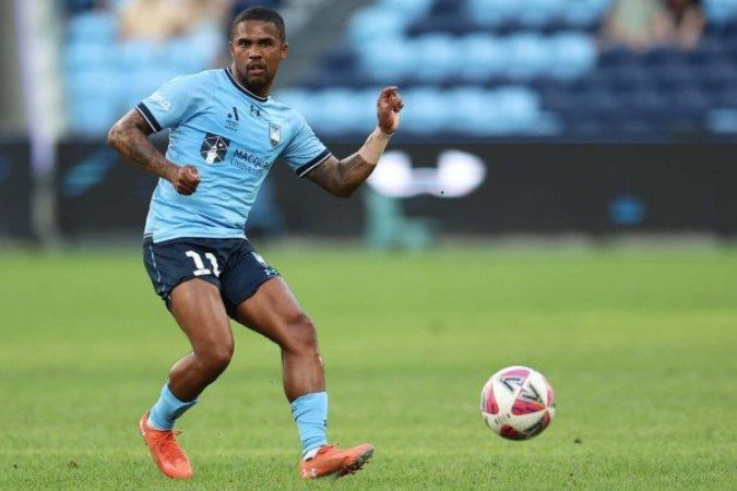 Douglas costa em ação com a camisa do Sydney FC, da Austrália - (crédito: Foto: Jeremy Ng/Getty Images) Douglas costa em ação com a camisa do Sydney FC, da Austrália - (crédito: Foto: Jeremy Ng/Getty Images)