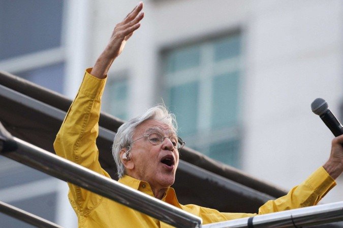 Muitos manifestantes usaram camisetas com as cores da bandeira do Brasil, normalmente um símbolo usado em protestos da direita radical -  (crédito: Amanda Perobelli/Reeuters)