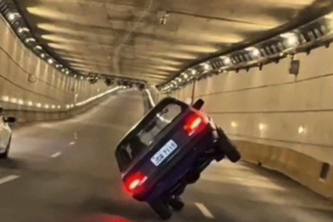 Influenciador faz manobra perigosa no Túnel Rei Pelé e é multado pelo Detran -  (crédito: Reprodução Redes Sociais)