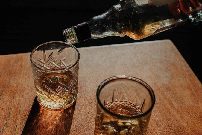 Bar Ministrão foi fechado em São Paulo por suspeita de metanol na bebida -  (crédito: Nelson Almeida/AFP via Getty Images)