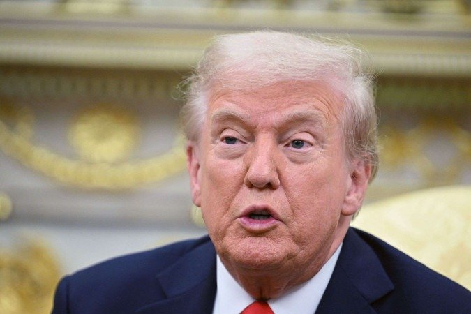 Presidente dos EUA anunciou que havia autorizado operações da CIA contra a Venezuela - (crédito: Jim Watson/AFP) Presidente dos EUA anunciou que havia autorizado operações da CIA contra a Venezuela - (crédito: Jim Watson/AFP)