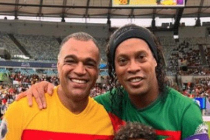 Ronaldinho Gaúcho e Denílson estarão na transmissão da Globo para Copa do Mundo -  (crédito: Foto: Reprodução)