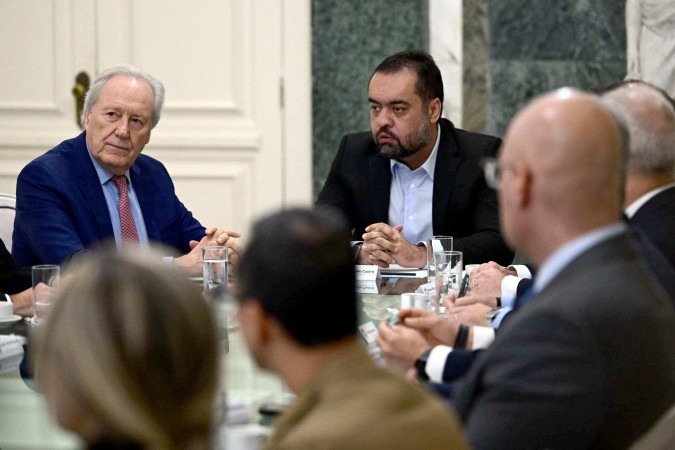 O ministro da Justiça (E) garantiu que o governo federal vai investir O ministro da Justiça (E) garantiu que o governo federal vai investir