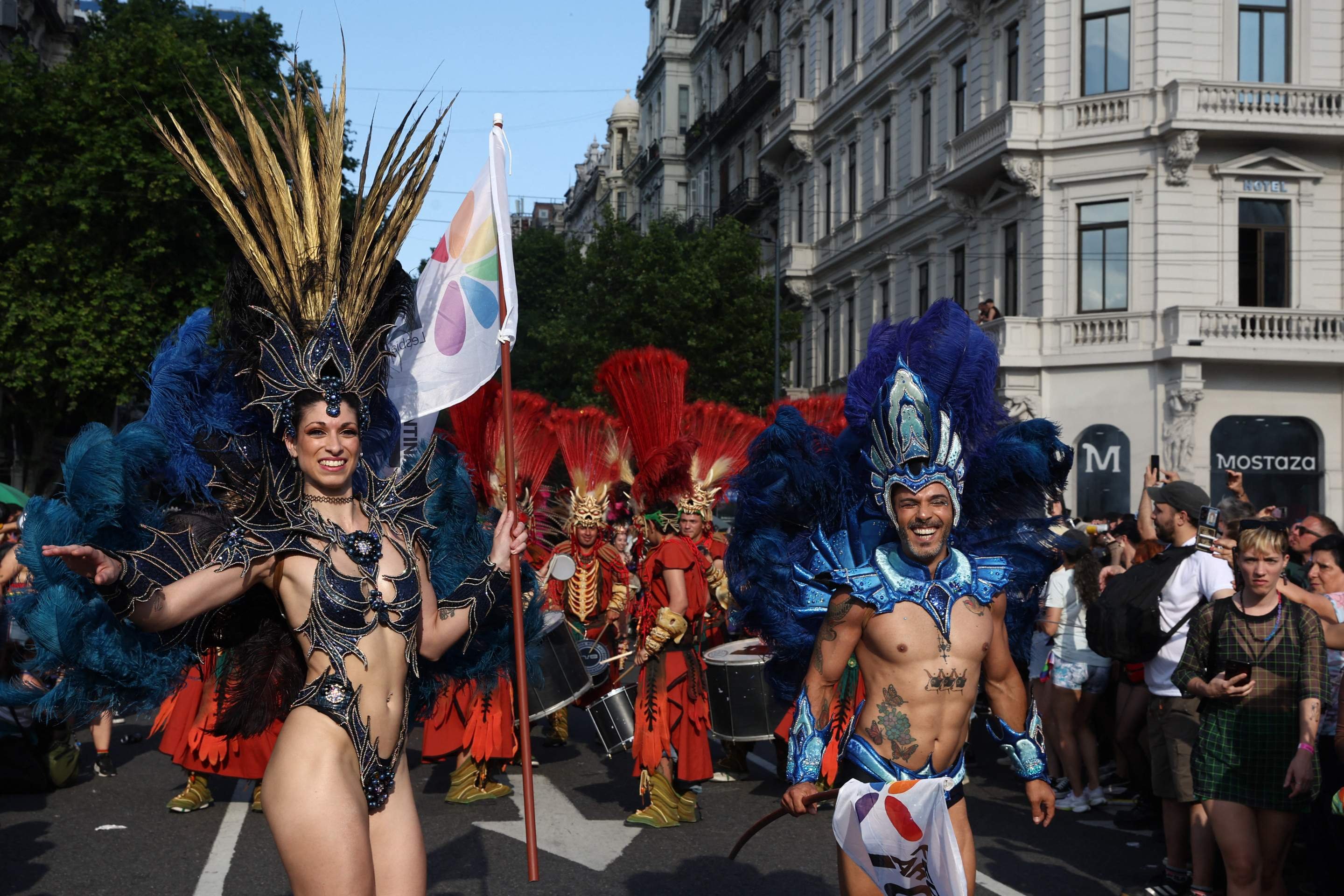  Revellers take part in the 34th Pride Parade in Buenos Aires on November 1, 2025. (Photo by Alejandro PAGNI / AFP)       