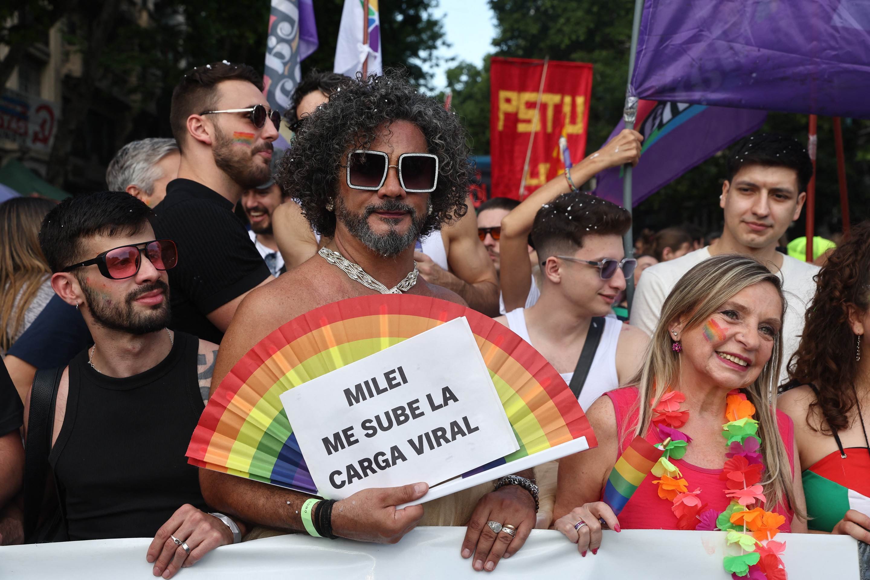  Revellers take part in the 34th Pride Parade in Buenos Aires on November 1, 2025. (Photo by Alejandro PAGNI / AFP)       
