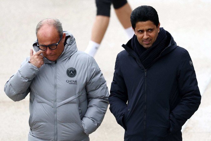  Paris Saint Germain's Portuguese Football Advisor Luis Campos (L) speaks with Paris Saint-Germain's Qatari president Nasser Al-Khelaïfi ahead of a training session at the Campus Paris Saint-Germain in Poissy, in the western outskirts of Paris, on November 25, 2025, on the eve of the UEFA Champions League first round day 5 football match between Paris Saint-Germain and Tottenham Hotspur. (Photo by FRANCK FIFE / AFP)
      Caption 