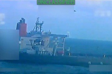  This screen grab from a video posted by US Attorney General Pam Bondi on her X account on December 10, 2025 shows what Bondi says is the execution of 