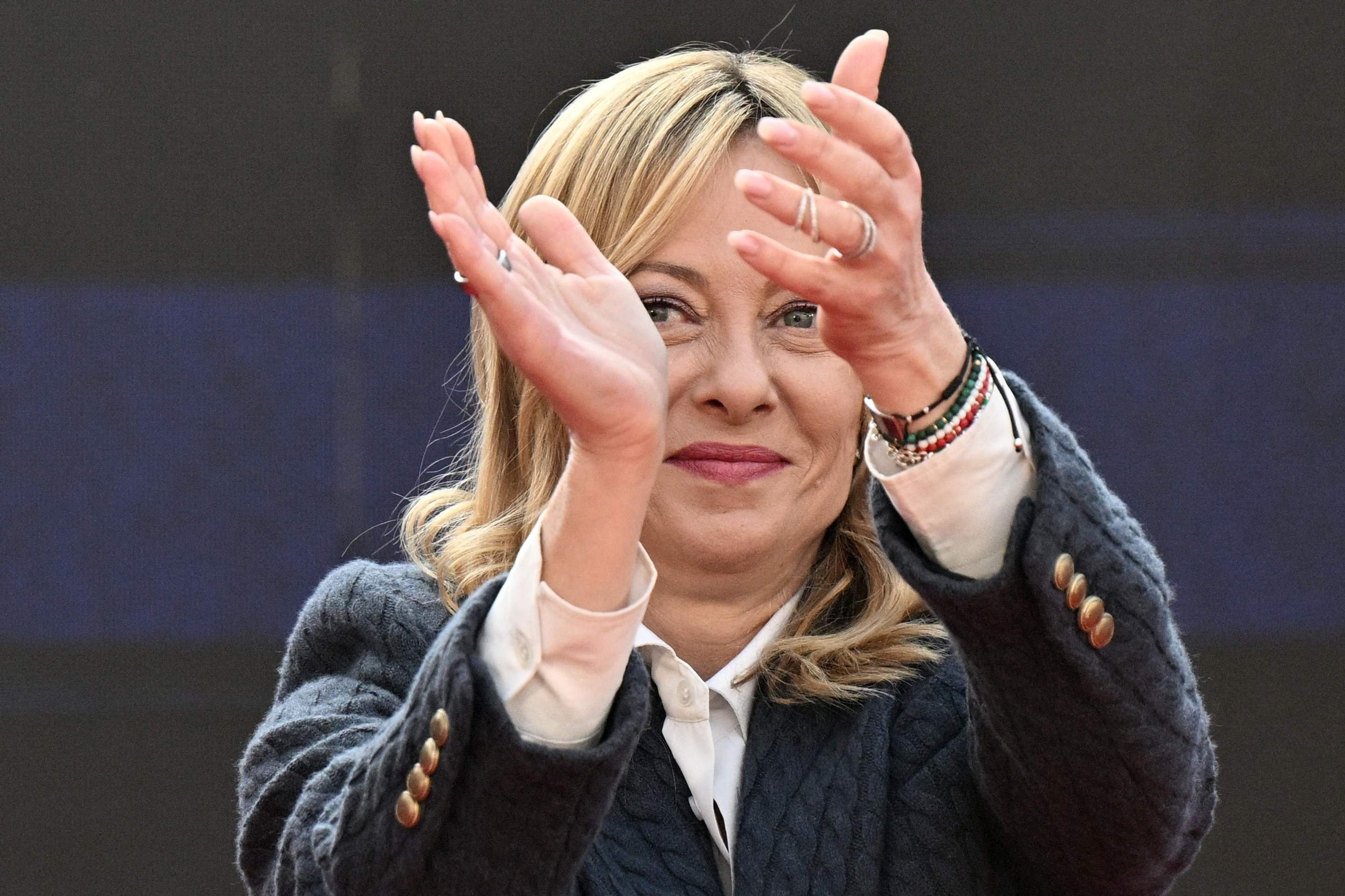  Italy's Prime Minister, Giorgia Meloni attends the Atreju political meeting organised by the young militants of Italian right wing party Brothers of Italy (Fratelli d'Italia) on December 14, 2025 in Rome. (Photo by Tiziana FABI / AFP)       