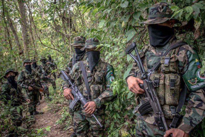 O tráfico de migrantes de centenas de milhares de pessoas entre 2021 e 2025 gerou uma importante injeção de recursos para comunidades locais na Colômbia e para grupos como o EGC, segundo especialistas - (crédito: DANILO GOMEZ/AFP via Getty Images) O tráfico de migrantes de centenas de milhares de pessoas entre 2021 e 2025 gerou uma importante injeção de recursos para comunidades locais na Colômbia e para grupos como o EGC, segundo especialistas - (crédito: DANILO GOMEZ/AFP via Getty Images)