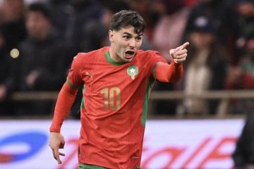  Guest and Morocco's forward #10 Brahim Diaz celebrates scoring his team's first goal during the Africa Cup of Nations (CAN) group A  football match between Morocco and Comoros at Prince Moulay Abdellah Stadium in Rabat on December 21, 2025. (Photo by SEBASTIEN BOZON / AFP)
       -  (crédito: SEBASTIEN BOZON/AFP)
