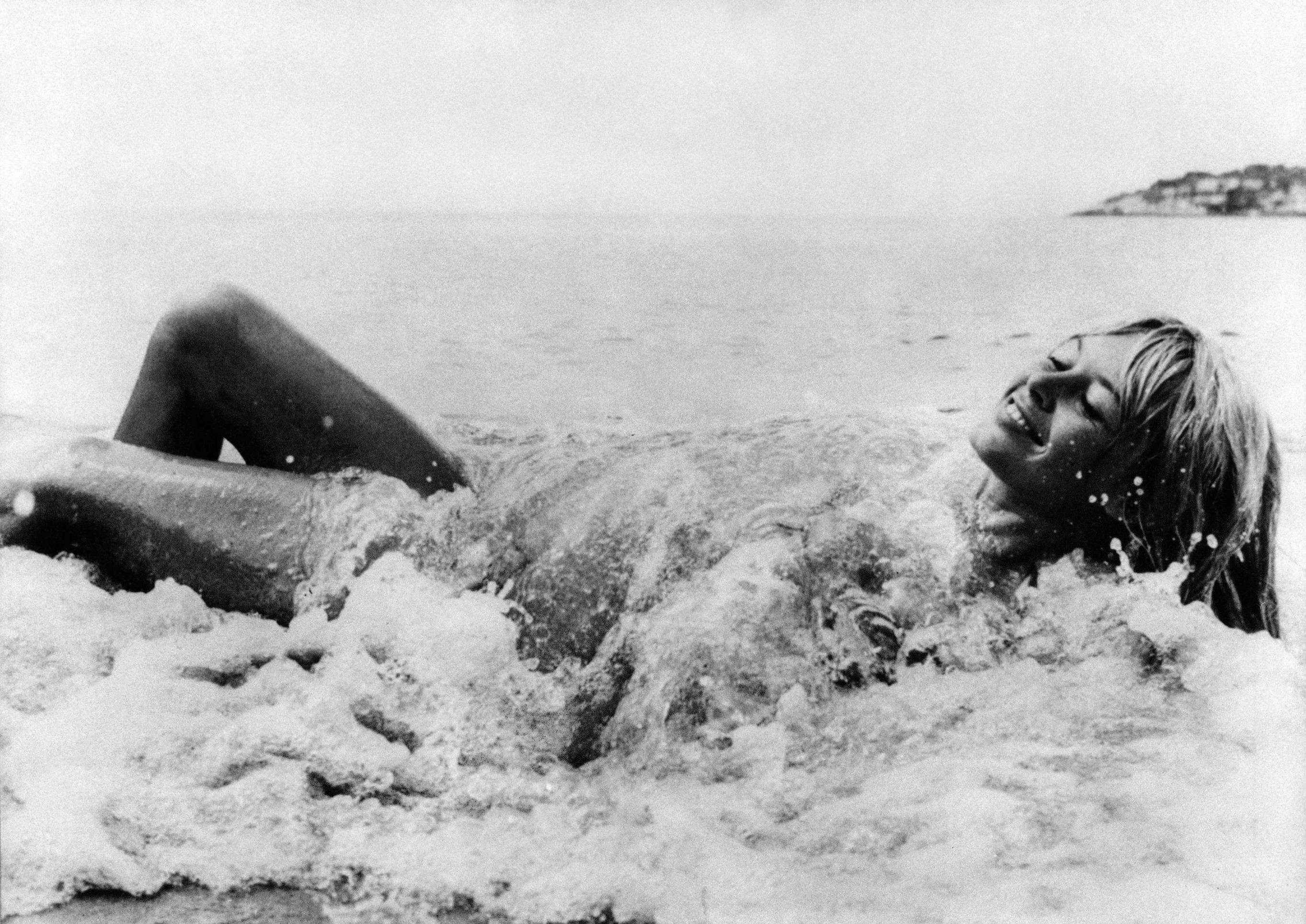  French actress Brigitte Bardot enjoys a peacefull bathing on a brasilian beach, March 20th 1964. (Photo by AFP)       