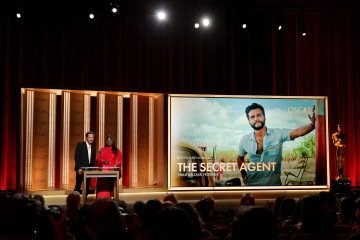 Os atores Lewis Pullman e Danielle Brooks, no momento do an&uacute;ncio dos candidatos a melhor filme: na lista, O agente secreto 
       -  (crédito:  Kevin Winter/Getty Images/AFP)
