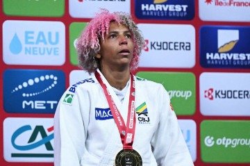A conquista de Rafaela Silva veio poucas semanas depois de a judoca deixar o Flamengo e retornar ao Instituto Reação, clube onde iniciou na modalidade -  (crédito: Julie SEBADELHA / AFP )