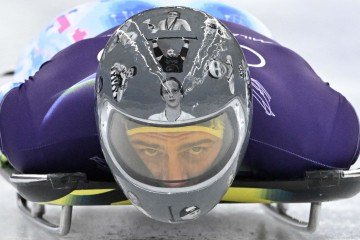  Ukraine's Vladyslav Heraskevych takes part in the skeleton men's training session at Cortina Sliding Centre during the Milano Cortina 2026 Winter Olympic Games in Cortina d'Ampezzo on February 11, 2026. (Photo by Tiziana FABI / AFP)
       -  (crédito:  AFP)