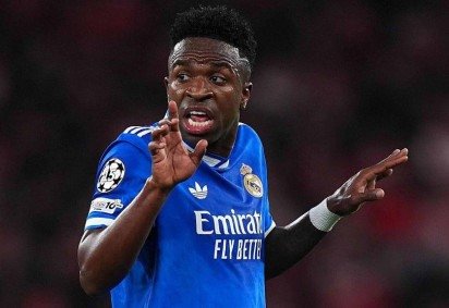 Gianlucca Prestianni e Vinicius Jr. durante partida do Benfica contra o Real Madrid -  (crédito: Getty Images) -Gianlucca Prestianni e Vinicius Jr. durante partida do Benfica contra o Real Madrid -  (crédito: Getty Images)