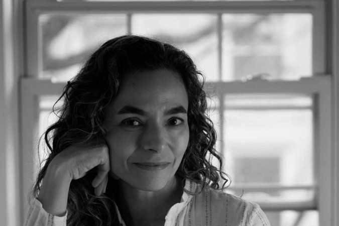 A editora de filmes Flávia de Souza