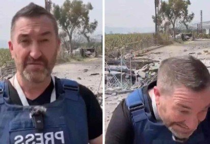 RepÃ³rter quase Ã© atingido por mÃ­ssil durante transmissÃ£o -  (crédito: ReproduÃ§Ã£o / RT )