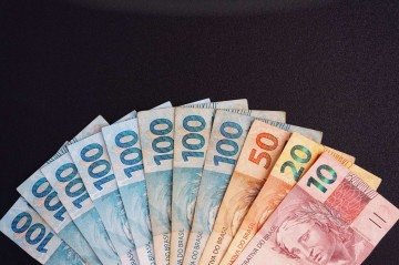 Cédulas de reais, moeda brasileira - (crédito: Reprodução/Canva) Cédulas de reais, moeda brasileira - (crédito: Reprodução/Canva)
