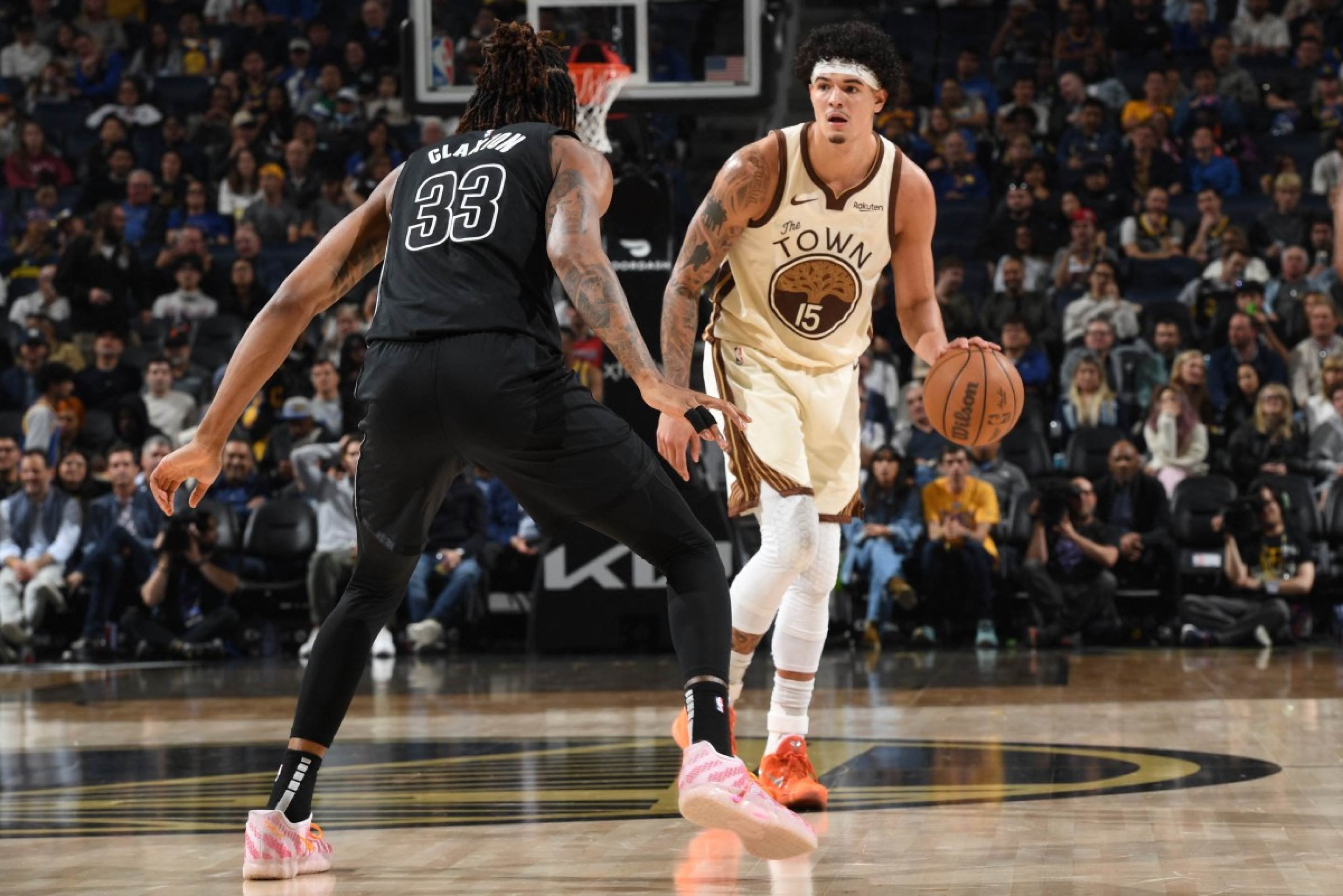  SAN FRANCISCO, CA - MARCH 25: Gui Santos #15 of the Golden State Warriors handles the ball during the game against the Brooklyn Nets on March 25, 2026 at Chase Center in San Francisco, California. NOTE TO USER: User expressly acknowledges and agrees that, by downloading and or using this photograph, user is consenting to the terms and conditions of Getty Images License Agreement. Mandatory Copyright Notice: Copyright 2026 NBAE   Noah Graham/NBAE via Getty Images/AFP (Photo by Noah Graham / NBAE / Getty Images / Getty Images via AFP)       
