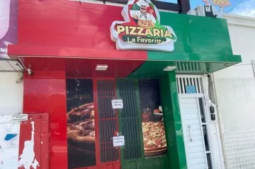 Pizzaria foi interditada após os casos de saúde pública - (crédito: Geraldo Jerônimo / TV Paraíba) Pizzaria foi interditada após os casos de saúde pública - (crédito: Geraldo Jerônimo / TV Paraíba)