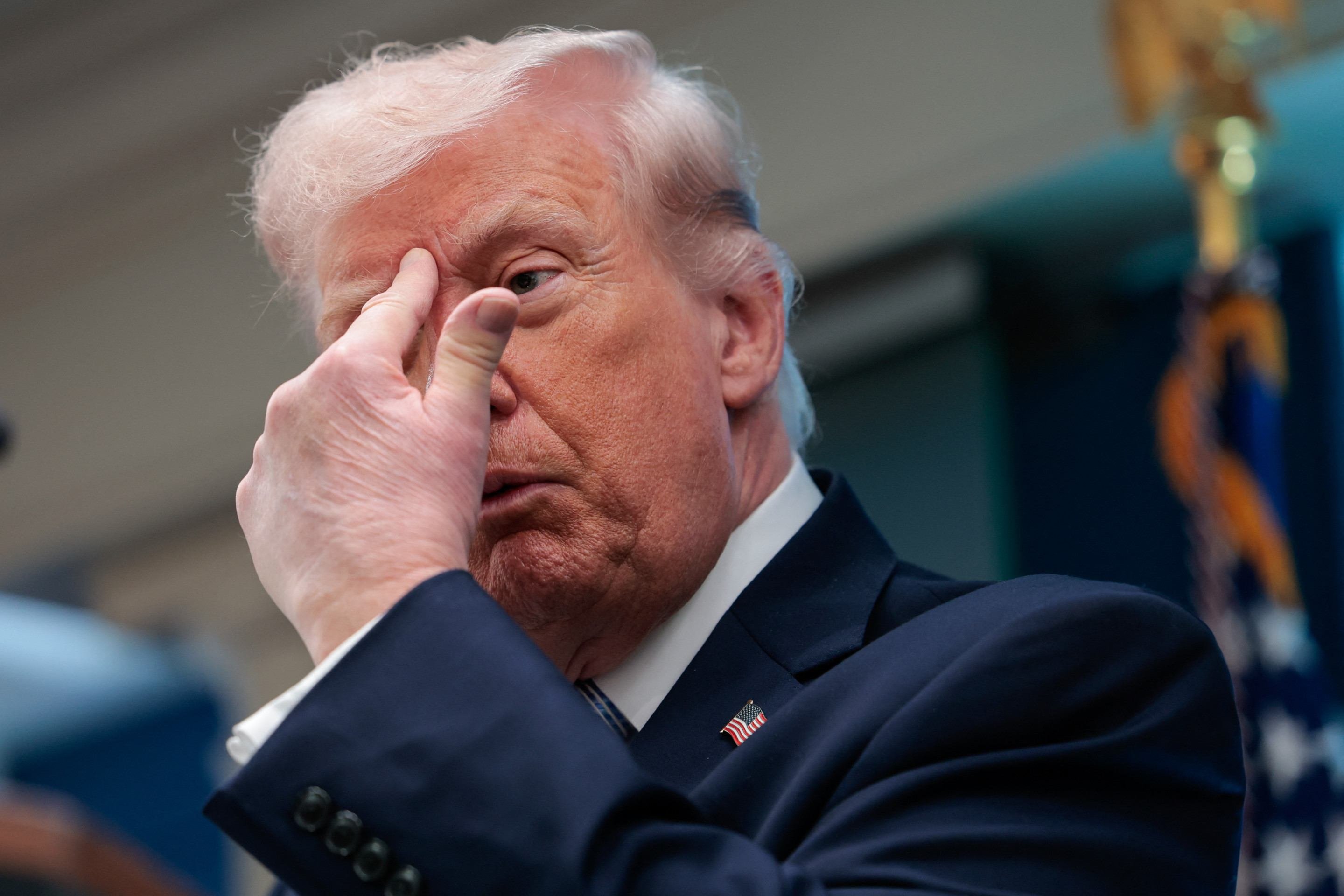  US President Donald Trump gestures as he speaks about the conflict in Iran in the James S. Brady Press Briefing Room of the White House on April 6, 2026, in Washington, DC. (Photo by Kent Nishimura / AFP)       